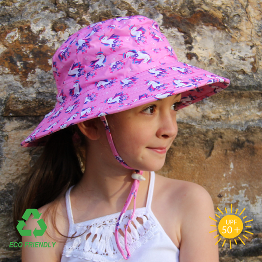 Side view of kids unicorn patterned bucket hat showing soft recycled fabric, wide brim for sun protection, and adjustable toggle for a snug fit