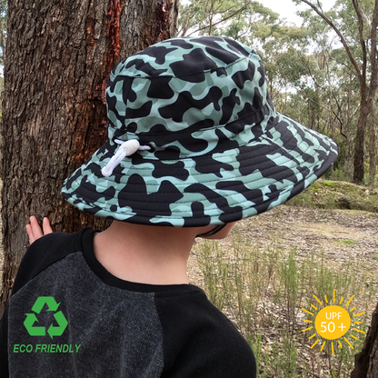 Back view of kids camo bucket hat showing adjustable toggle for secure fit, soft recycled rpet fabric, and extended brim for full neck coverage
