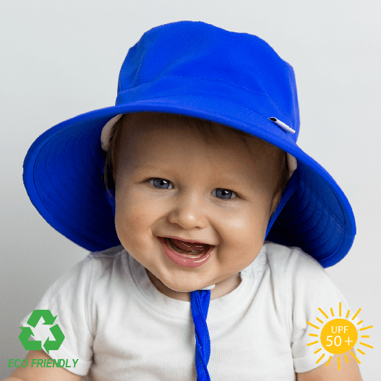 Royal blue kids bucket hat with wide brim and breakaway chin strap, made from lightweight recycled fabric for everyday sun protection.
